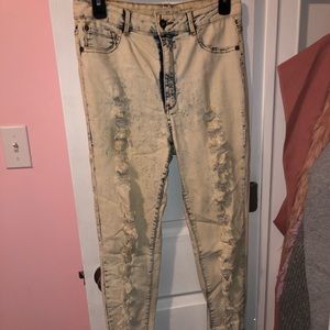 High waisted acid washed distressed jeans